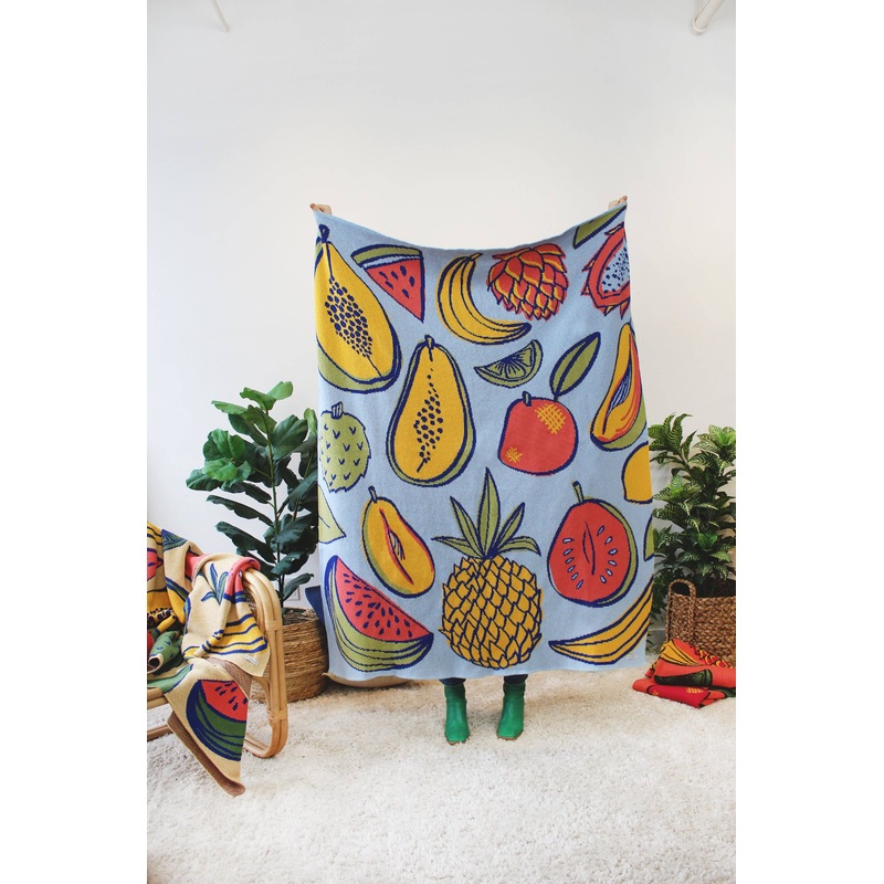 TROPICAL FRUIT SALAD KNIT BLANKET: BLUEBERRY has soft blue ground