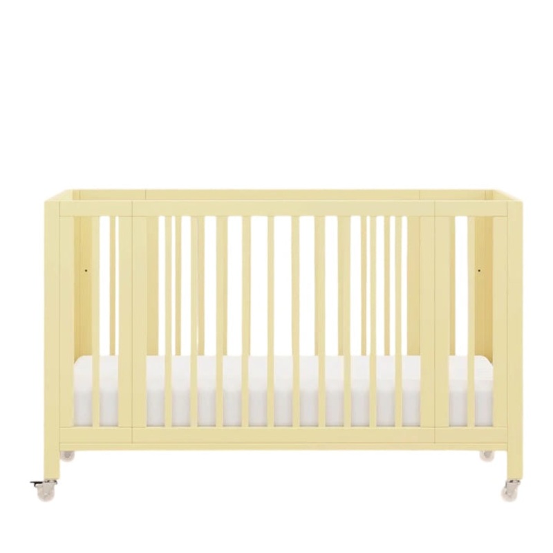 Babyletto Rolli 9-in-1 Convertible All-Stages Crib with Bassinet & Toddler Bed Conversion Kits Pale Yellow
